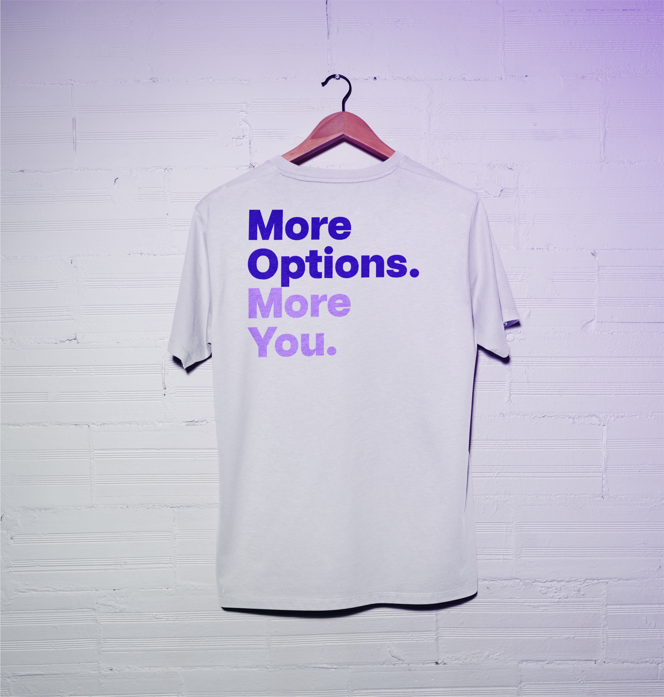 Loanoptions.ai Merch store. A shirt hung off a white wall 